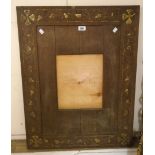 A 32 1/4" X 25" carved oak picture frame with ivy and Celtic cross decoration, inscribed December