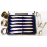 A cased set of six silver handled fruit knives - sold with three silver napkin rings and three