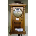 An early 20th Century inlaid oak cased timepiece with HAC movement, visible pendulum and Irish