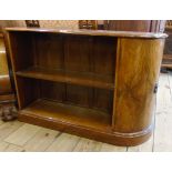 A pair of 35" 1930's walnut bedside units, each with two open shelves and curved ends enclosed by