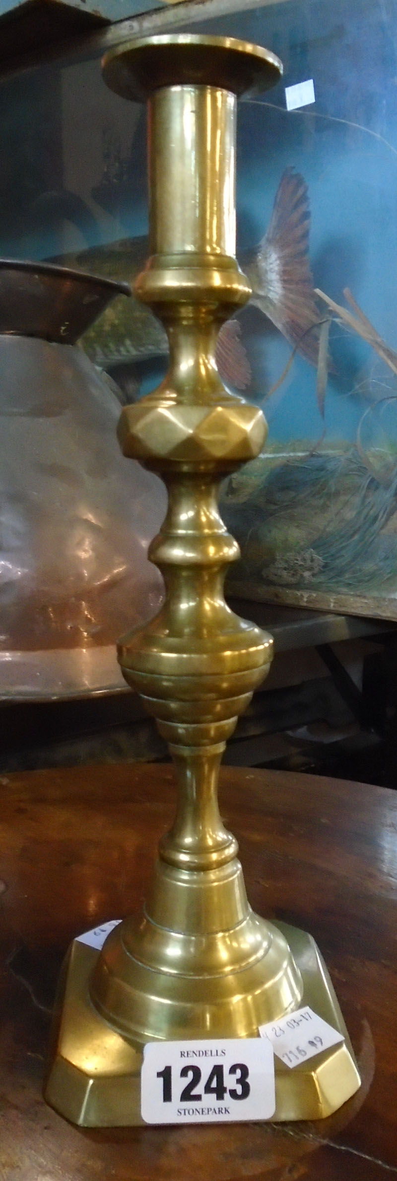 A heavy brass candlestick