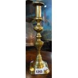 A heavy brass candlestick