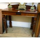 A 3' 1" Victorian mahogany hall table with shaped raised back, canted corners to front and moulded