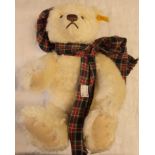 A 13" modern Margarete Steiff commemorative seasonal Teddy bear with ear tag, label and growler -