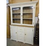 A 5' Victorian painted pine two part dresser with shelves enclosed by glazed panel doors to top,