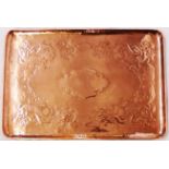 A 21 1/2" Newlyn embossed copper oblong tray with piscatorial decoration - marked to top
