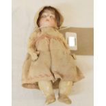 A 7" German Heubach 250-17/0a bisque headed doll with sleeping eyes, open mouth with visible