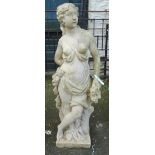 A 3' 11" cast concrete garden statue in the form of a scantily clad classical female holding flowers