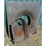 A Victorian four piece cast iron fireplace