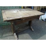 A mid 20th Century oak drawer leaf extending table - a/f