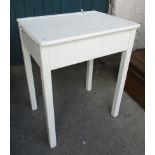 A child's school desk with later painted finish