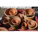 A quantity of terracotta plant pots - various sizes and styles