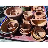 A quantity of terracotta plant pots - various sizes and styles