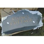 A 22" natural slate house name sign with carved gilt text "Stoney Cottage"