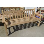 A 5' 2" slatted wood three seater garden bench