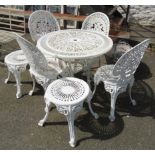 A set of four white painted cast aluminium garden chairs, circular table and two circular occasional