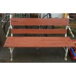 A 4' 6" bench with cast iron branch pattern ends