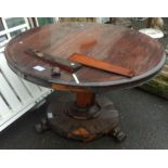 An early Victorian mahogany circular pedestal breakfast table - in need of total restoration