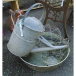 Two Victorian wire hanging baskets - sold with a galvanised watering can and a circular shallow