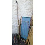 A small hand sythe, long handled loppers, folding deck chair, etc.