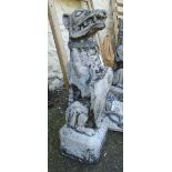 A pair of 31" pre cast concrete seated dogs with lead collars holding shields, set on plinth bases