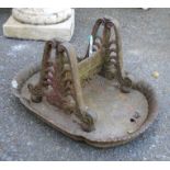 A Victorian cast iron boot scrape with acanthus decoration