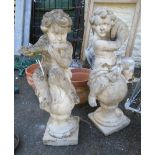 A pair of 3' 5" concrete putti musicians playing tambourine and flute - one with old repair