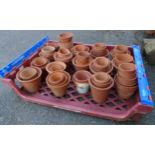 A large quantity of terracotta plant pots