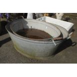 Two early 20th Century galvanised wash tubs