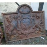 A 30" cast iron fire back with Royal coat of arms decoration