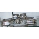 Two silver plated wine coasters and a pair of semi reeded pots - sold with a pair of silver napkin