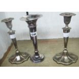 A pair of 9 1/2" silver plated candlesticks - sold with a Martinoid trumpet vase