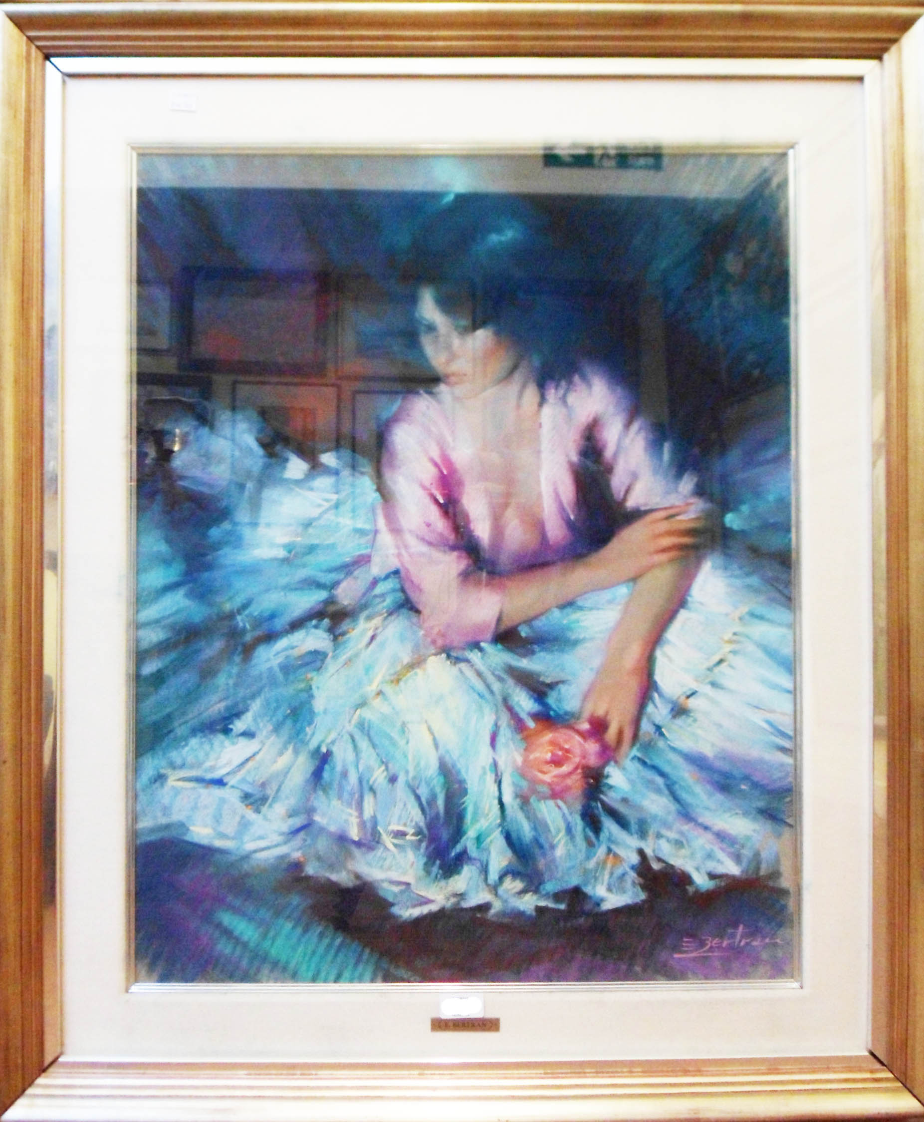 E. Bertran: a modern gilt framed and slipped pastel portrait of a flamenco girl holding a rose -