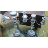 A pair of 16" silver plated three branch candlesticks with detachable nozzles and top sections - one