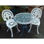 A painted aluminium garden table - sold with a pair of associated chairs