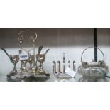 A silver plated four place egg cruet - sold with a toast rack and a moulded glass preserve pot