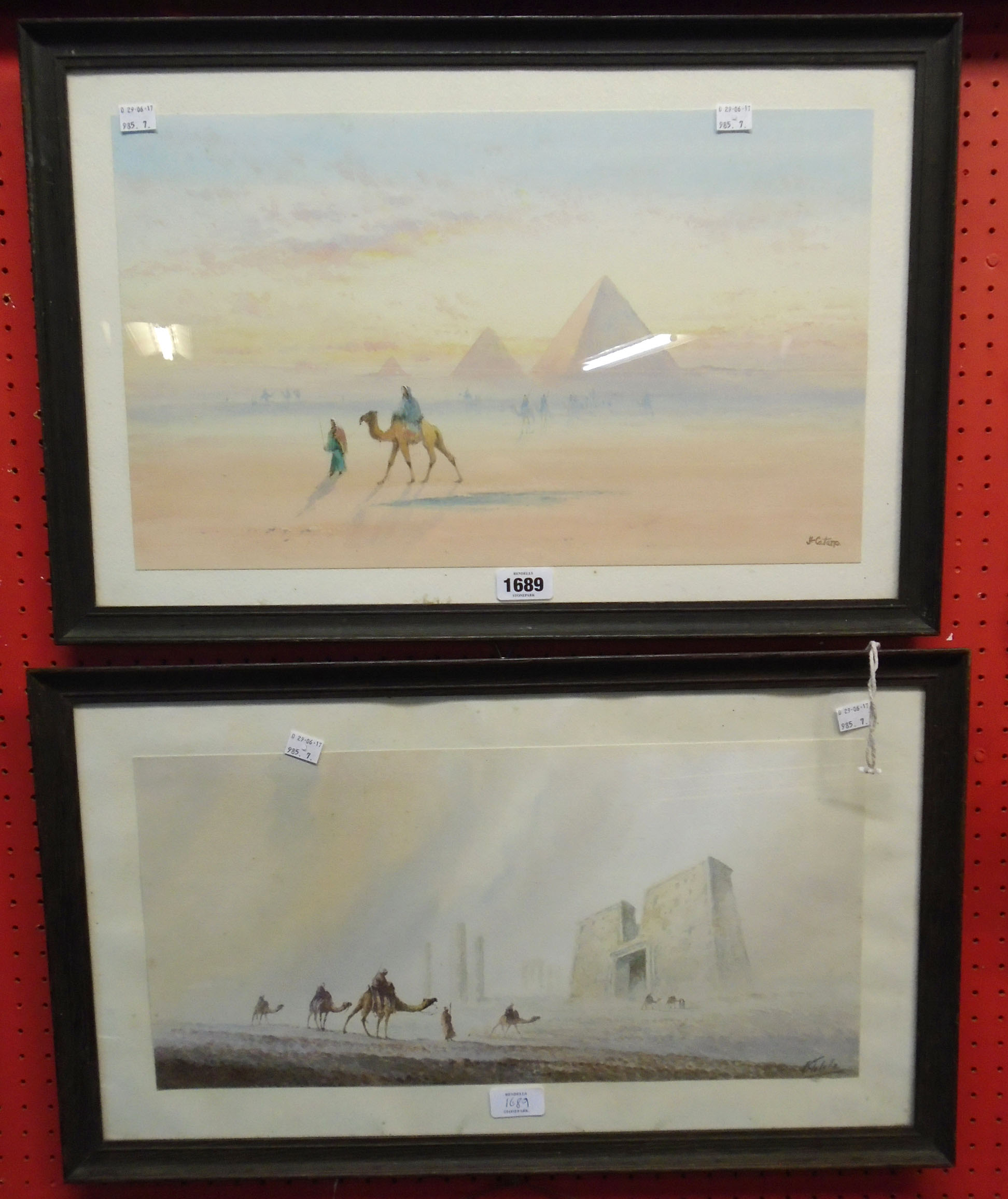 Frank Catano: a framed watercolour, depicting camel riders at Giza - sold with a pair of framed