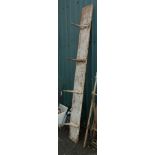 An 8' 5" long Victorian pine rustic shelf bracket with four cast iron hooks - two a/f