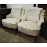 A pair of Italian style boudoir chairs with button back and rope twist piping to small floral repeat