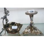 A silver plated ornate tazza base with three cast applied gryphons - sold with a leaf patter dish