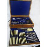 An early 20th Century brass bound oak tray fitted canteen containing a complete set of John Nowill