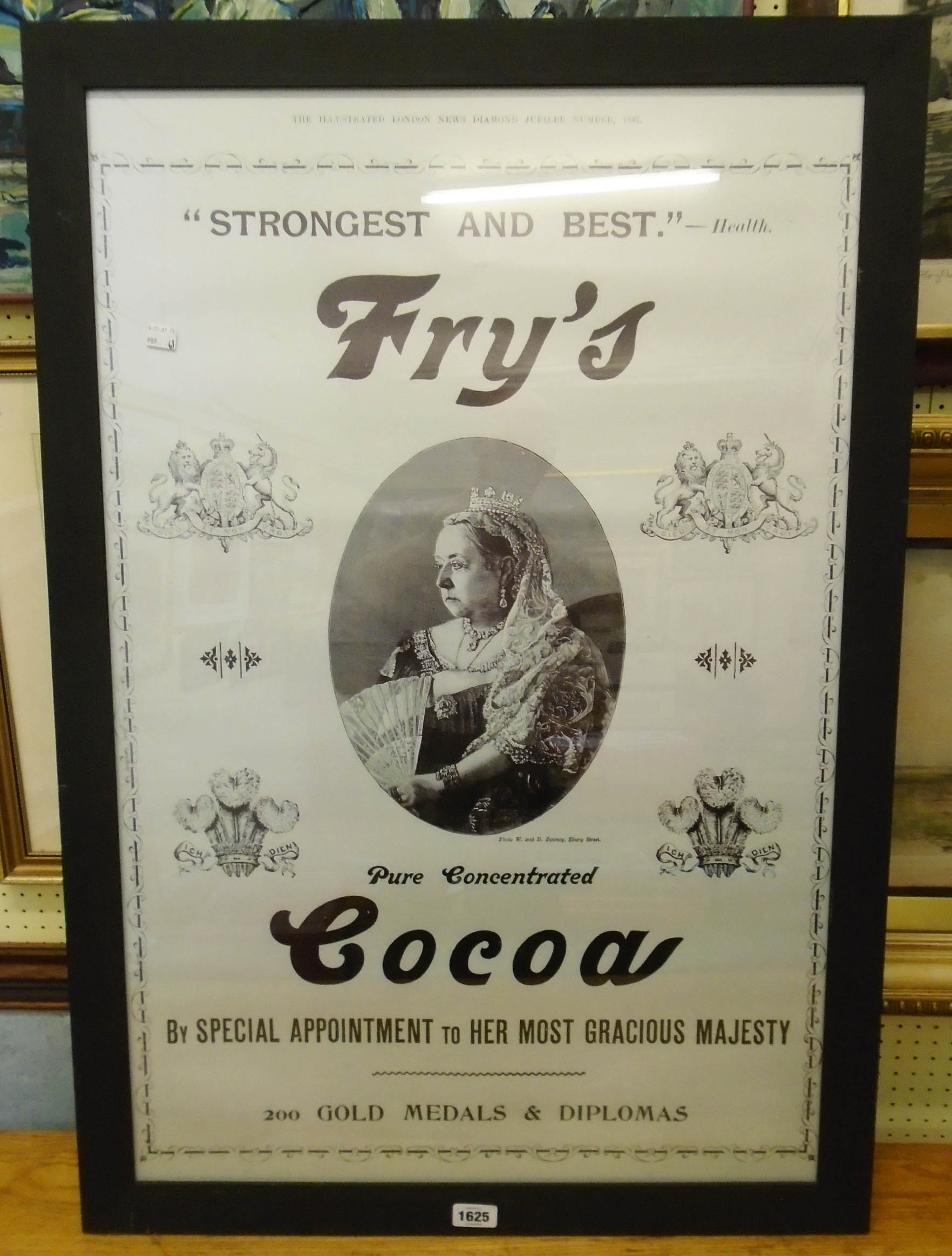 An ebonized framed monochrome reprint Fry's Cocoa advertising poster with central portrait of