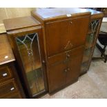 A 3' 7" mid 20th Century polished oak side-by-side bureau bookcase with fall, drawer and double