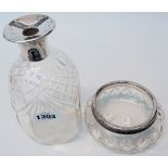 A silver topper cut glass decanter (stopper missing) - sold with a silver rimmed pot