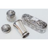 A silver pepper pot - sold with two cut glass dressing pots with silver lid and one other lid