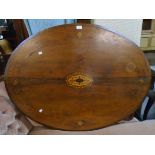 A 3' 9" Victorian inlaid rosewood oval loo table top with central motif and quarter veneers