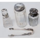 Three silver topped glass jars - sold with a pair of silver sugar nips