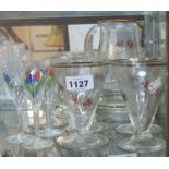 A mid 20th Century cocktail set, rose decorated jug and six conical shaped glasses - sold with three