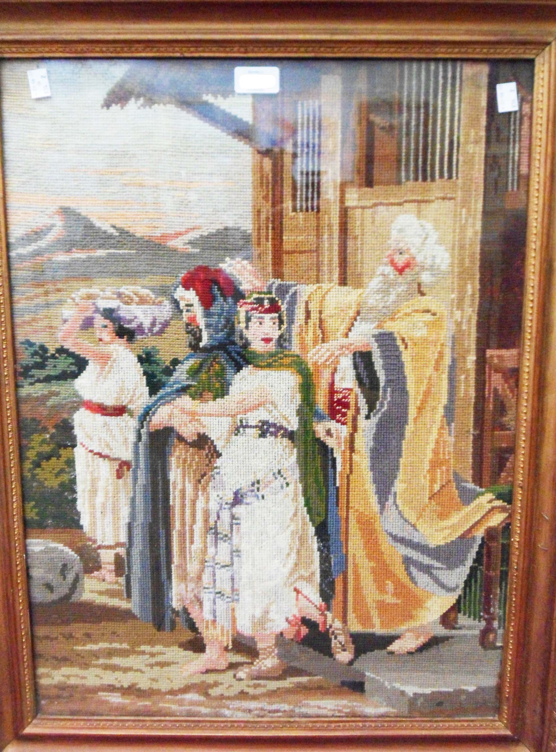 A gilt framed late Victorian tapestry woolwork panel "Laban Blessing Rebekah"