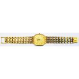 A marked 18k yellow metal Longines gentleman's quartz dress watch with rounded square dial and